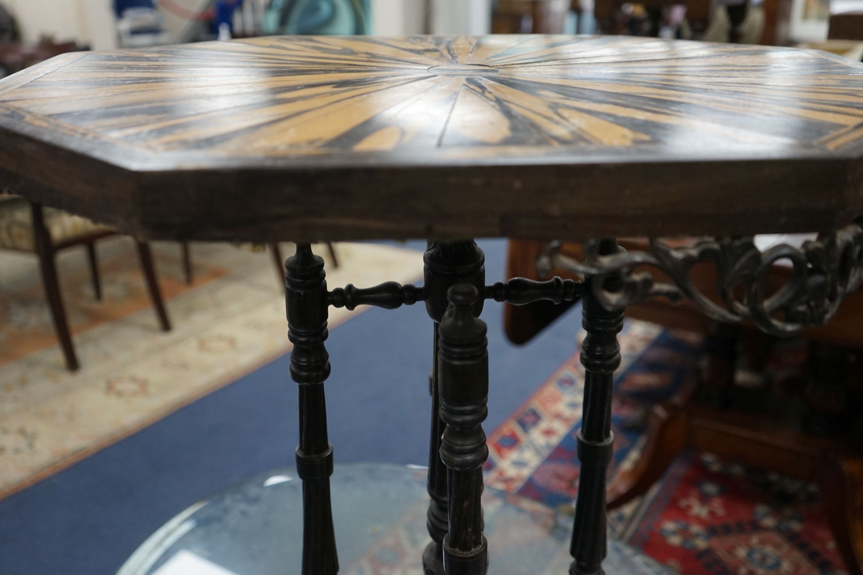 A 19th century Celanese carved ebony and coromandel veneered octagonal occasional table, width 57cm, depth 42cm, height 70cm